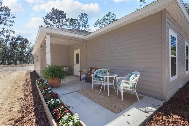 a picture of a living room with furniture