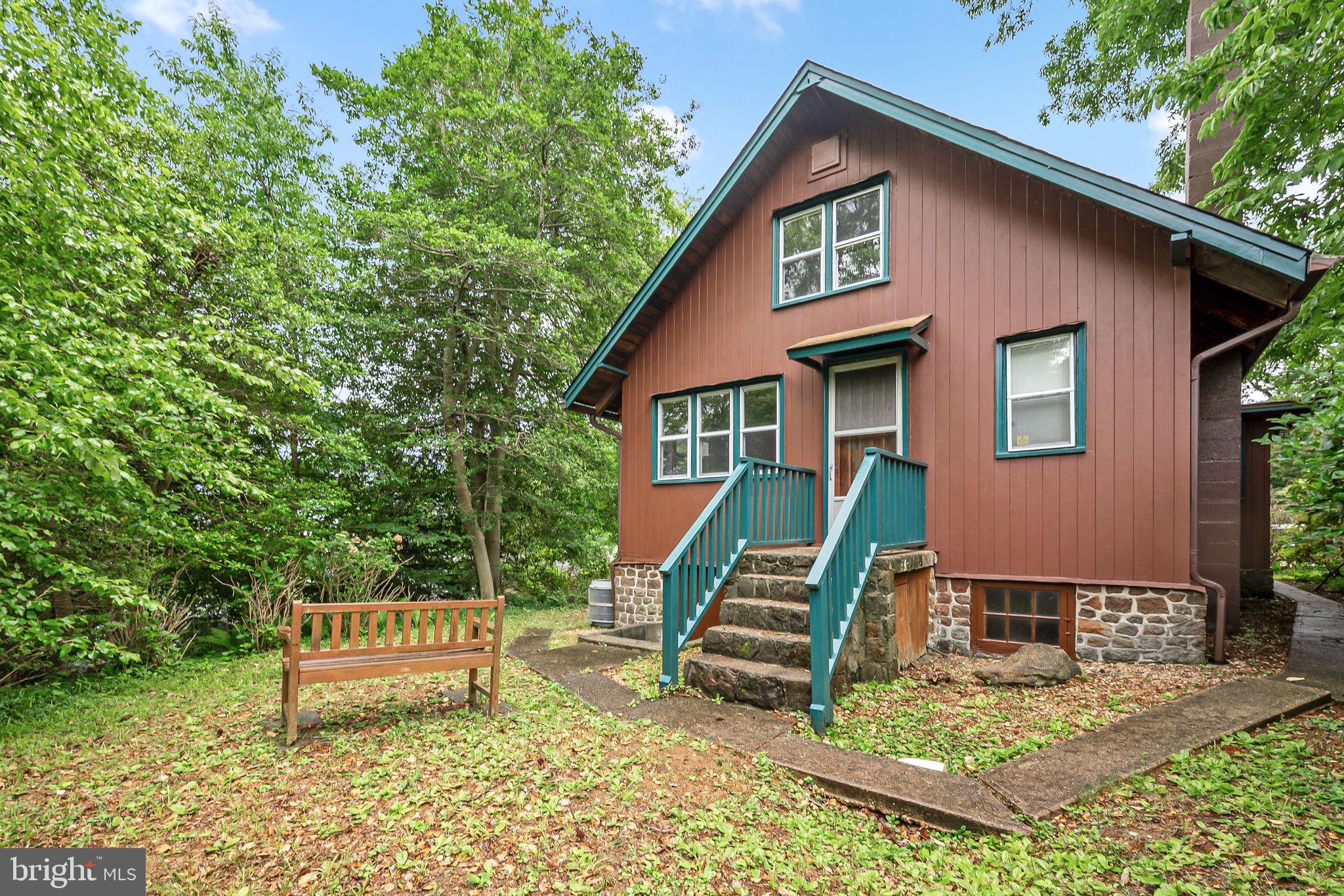 2138 Cedar Road Port Republic, MD 20676 - Photo 25 of 34 a view of a house with a yard and lawn chairs