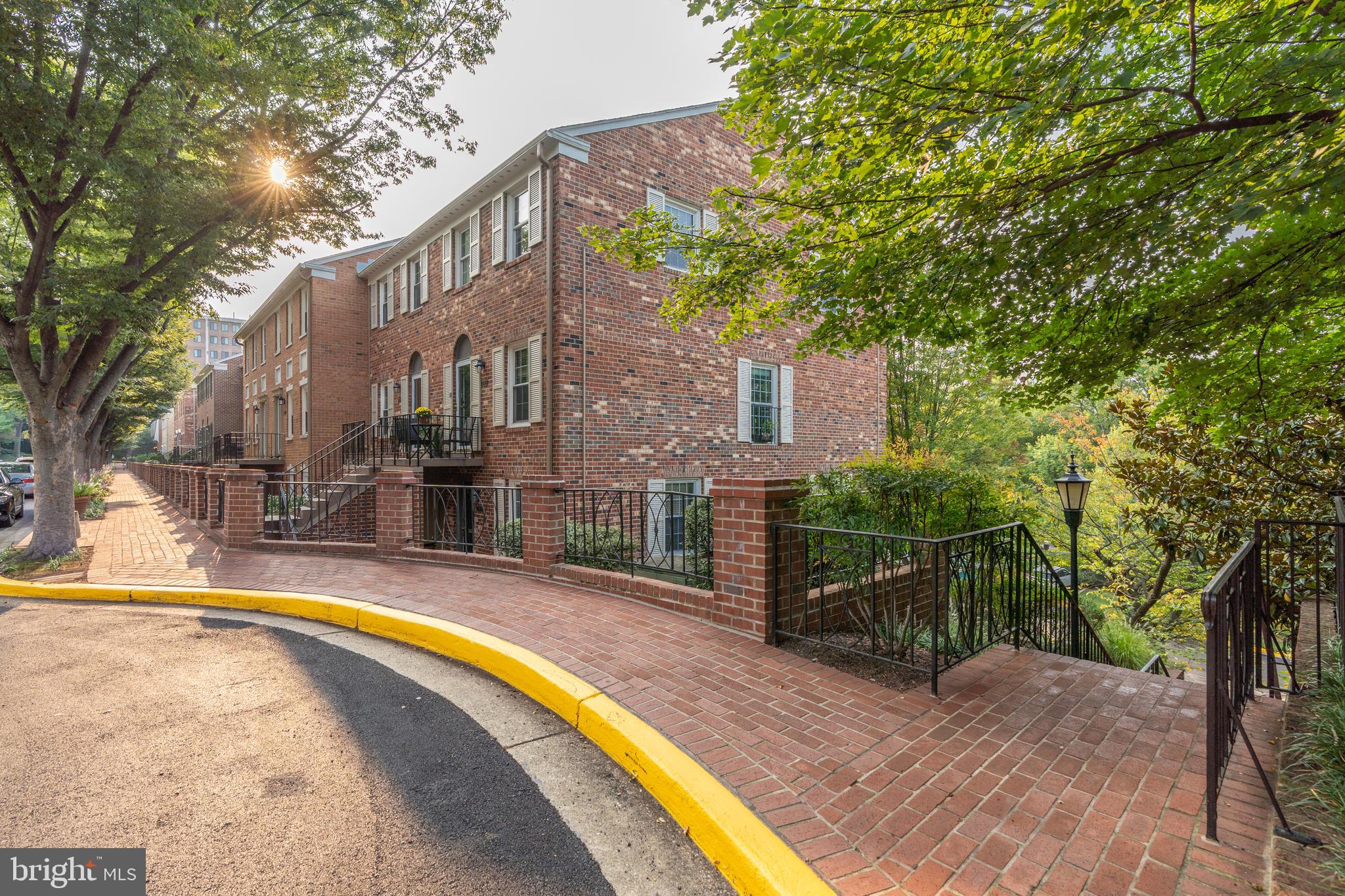 3299 Sutton Place Northwest, Unit C Washington, DC 20016 - Photo 33 of 40 a view of a house with swimming pool