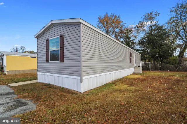 a view of a backyard of the house