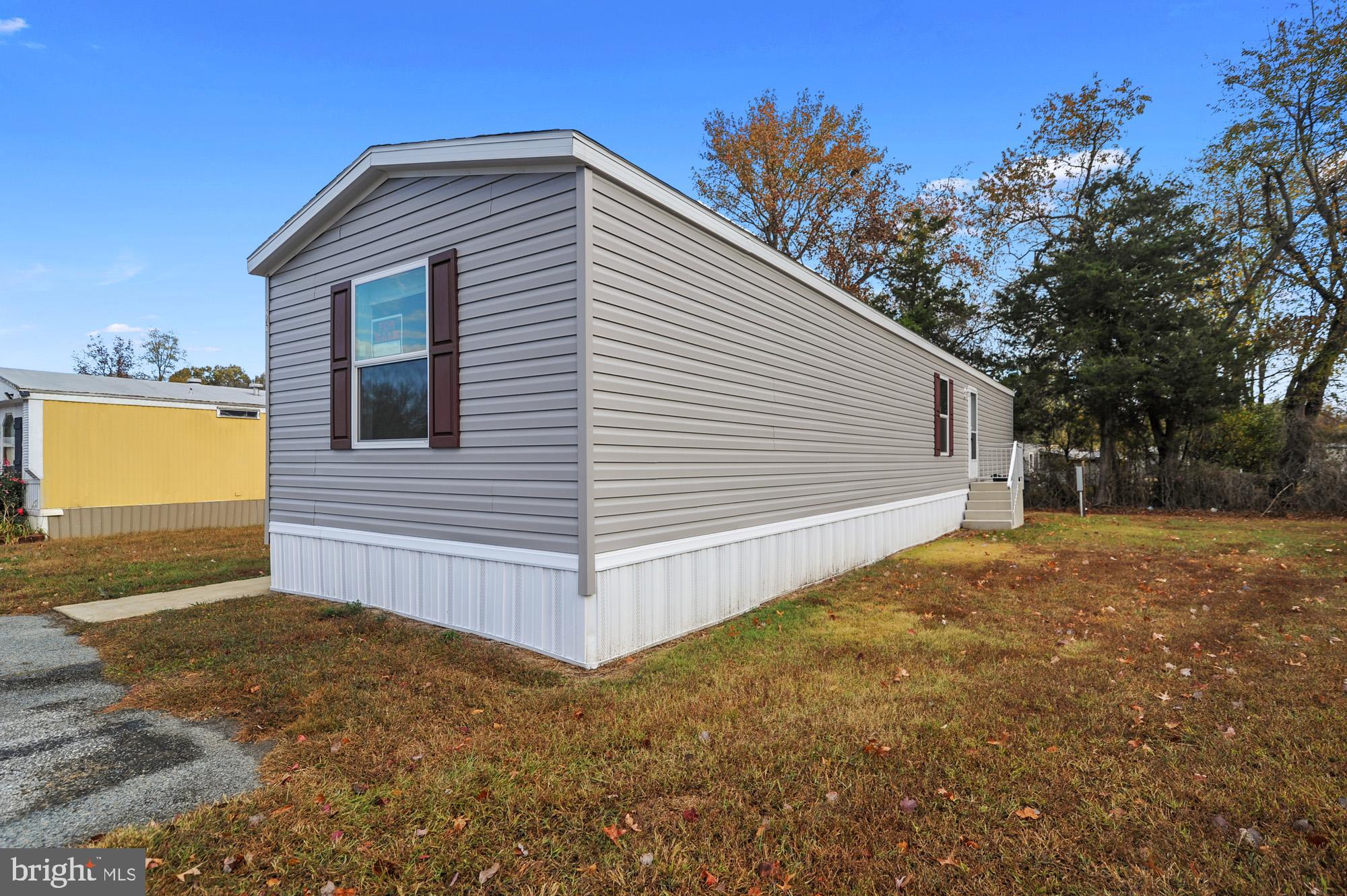 1061 South Little Creek Road, Unit 207 Dover, DE 19901 - Photo 5 of 20 a view of a backyard of the house