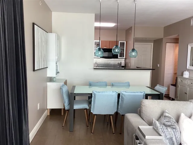 a view of a dining room with furniture