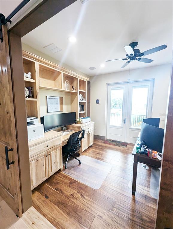 710 Albee Road West Nokomis, FL 34275 - Photo 17 of 30 a living room with a couch furniture and a window