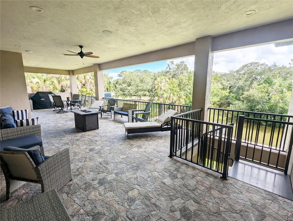 710 Albee Road West Nokomis, FL 34275 - Photo 27 of 30 a living room with furniture and a large window