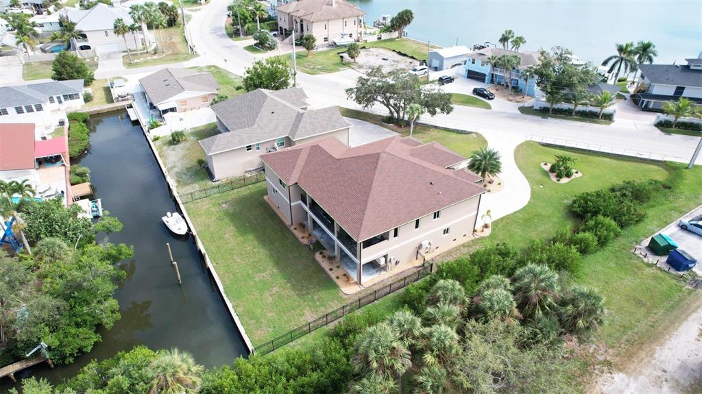 710 Albee Road West Nokomis, FL 34275 - Photo 5 of 30 an aerial view of a house with a yard