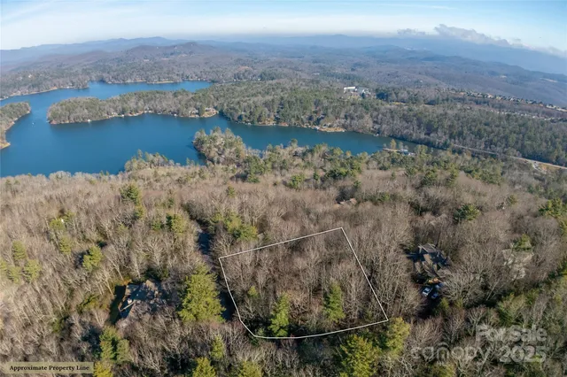 a view of a lake with mountains in the background