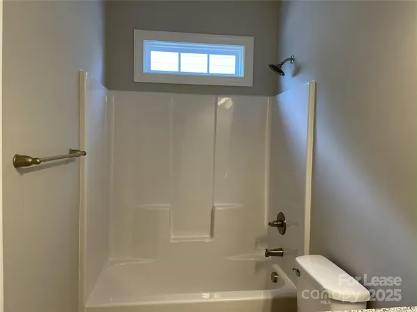 a front view of a house with balcony