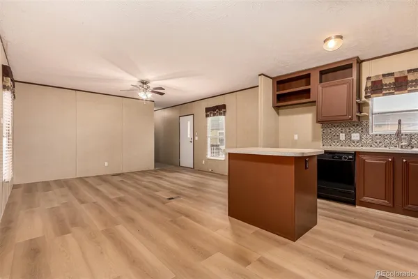 a view of a kitchen with a sink