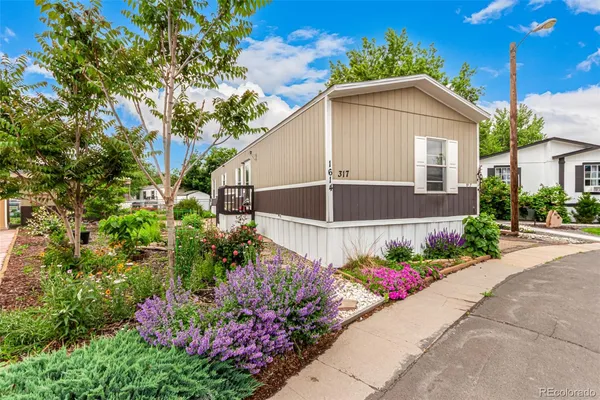 a house with a flower garden