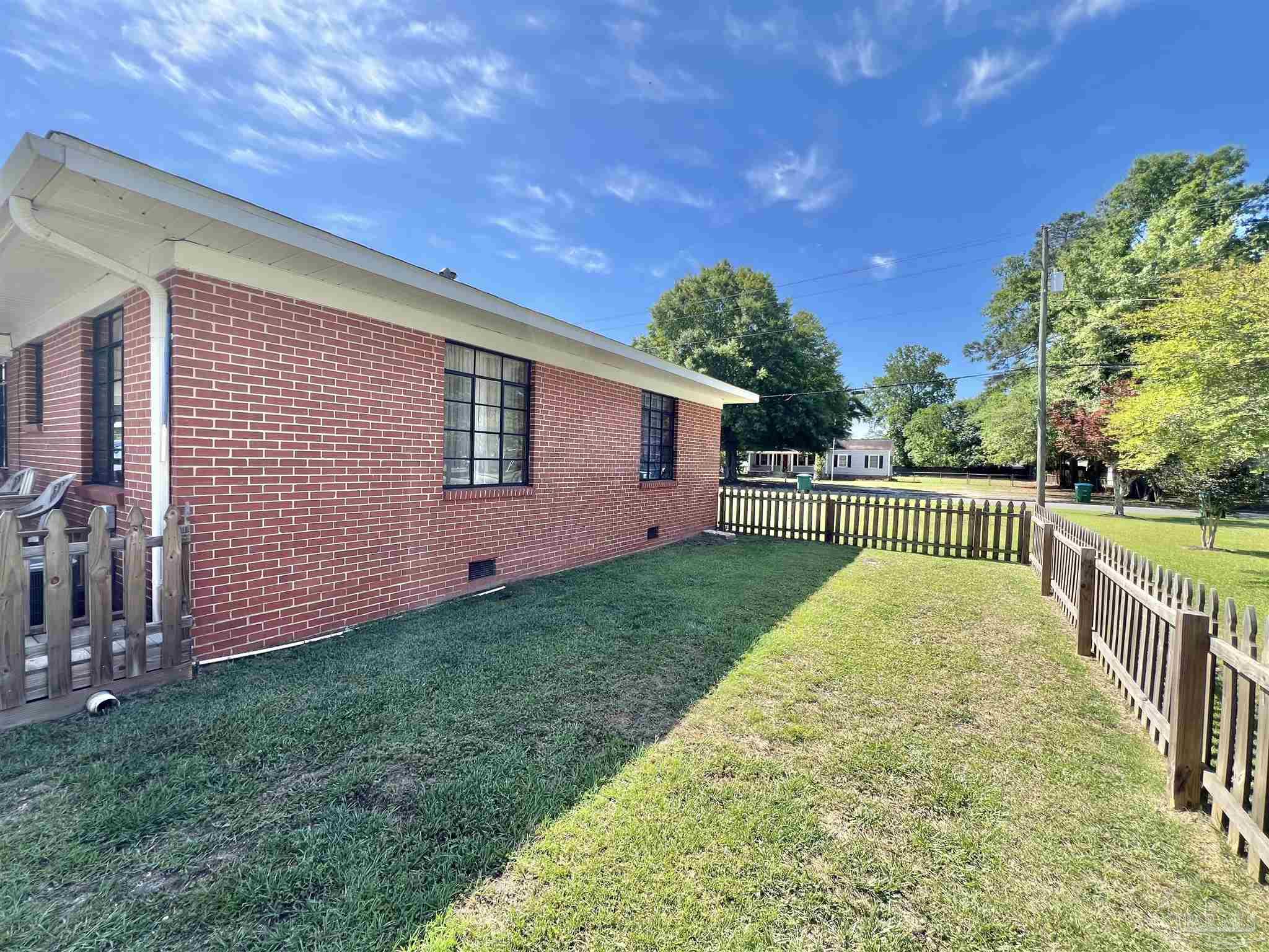 707 East Horner Street Atmore, AL 36502 - Photo 26 of 28 a view of a backyard with pathway