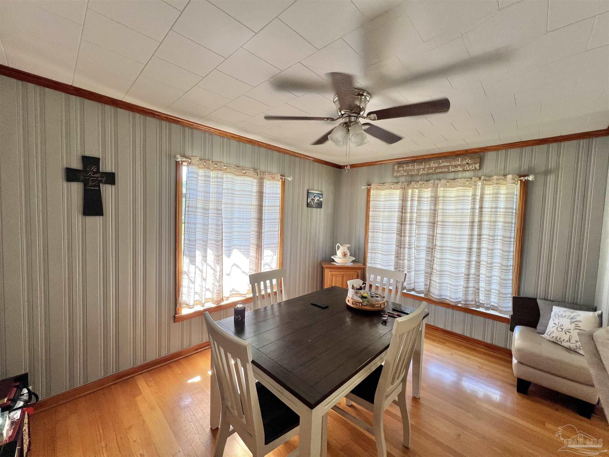 707 East Horner Street Atmore, AL 36502 - Photo 5 of 28 a view of a workspace with furniture and a window