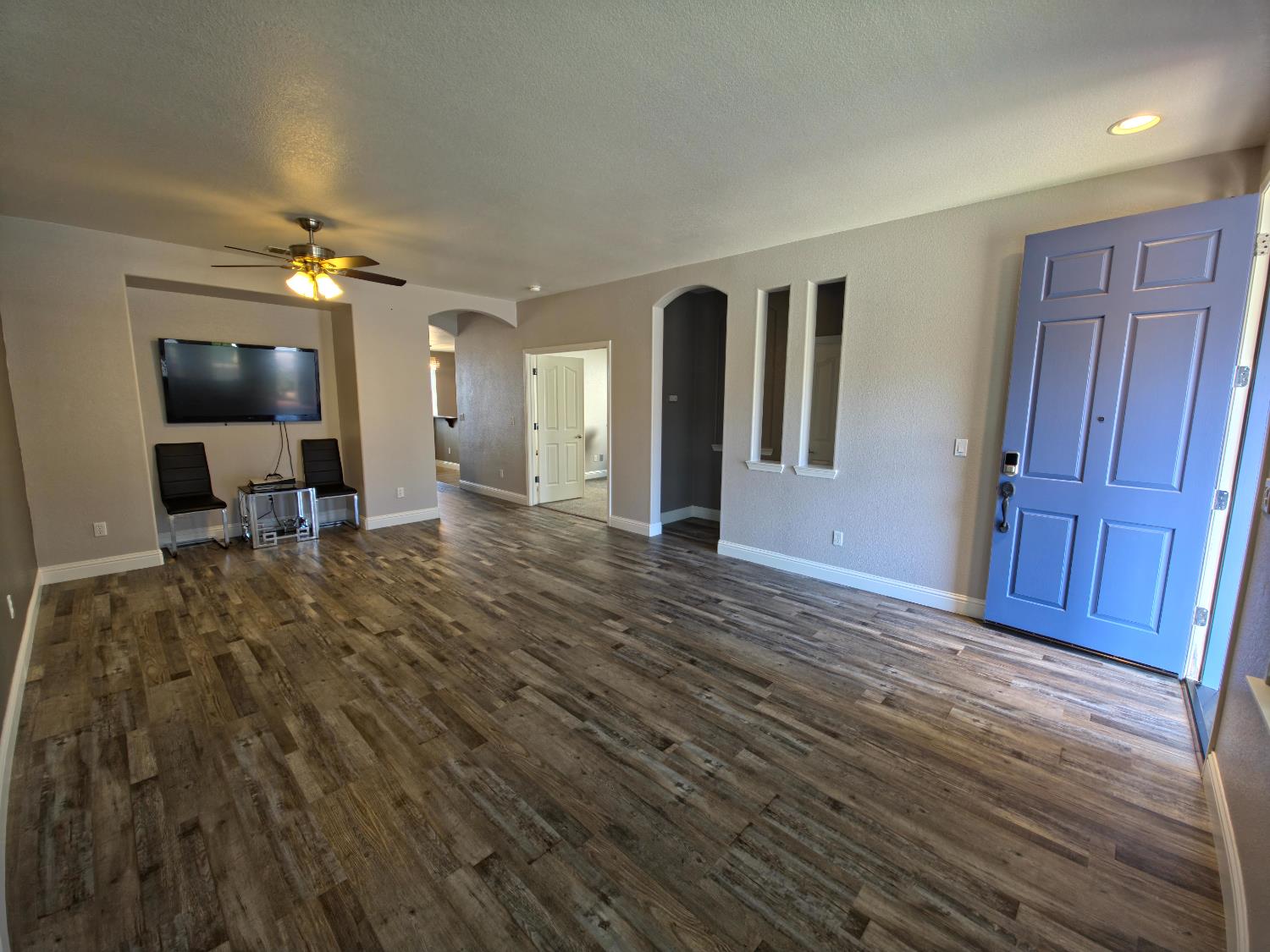 11724 Brook Valley Way Rancho Cordova, CA 95742 - Photo 15 of 32 a view of a livingroom with furniture and wooden floor