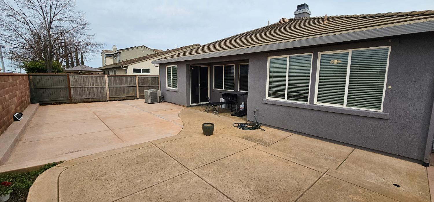 11724 Brook Valley Way Rancho Cordova, CA 95742 - Photo 31 of 32 a view of house with backyard
