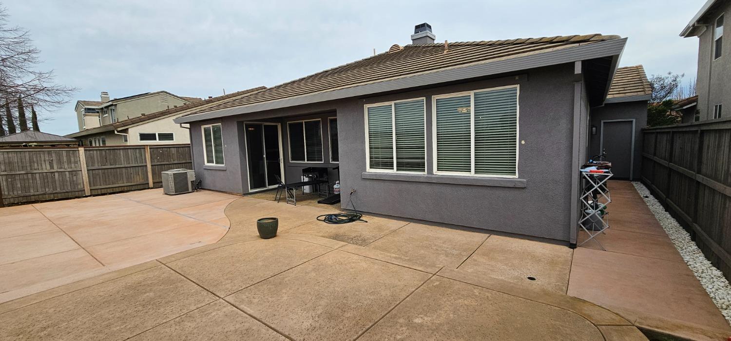 11724 Brook Valley Way Rancho Cordova, CA 95742 - Photo 32 of 32 a front view of a house with glass door