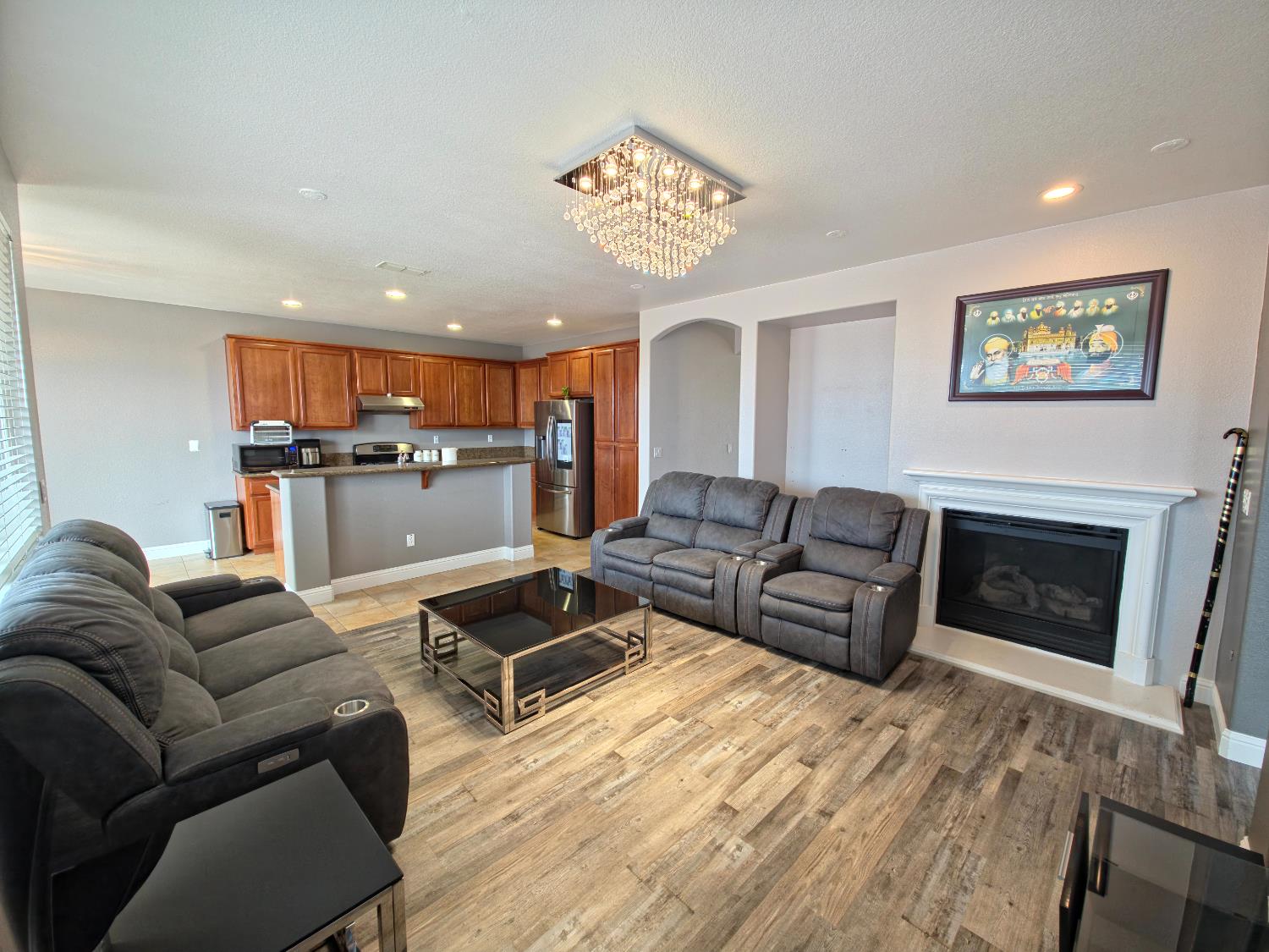 11724 Brook Valley Way Rancho Cordova, CA 95742 - Photo 5 of 32 a living room with furniture and a fireplace