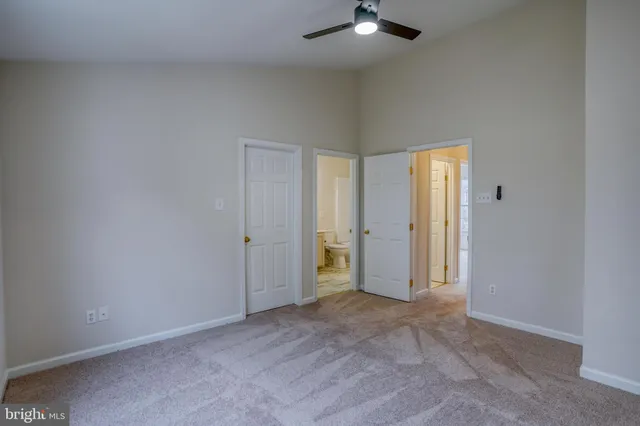 an empty room with a bathroom