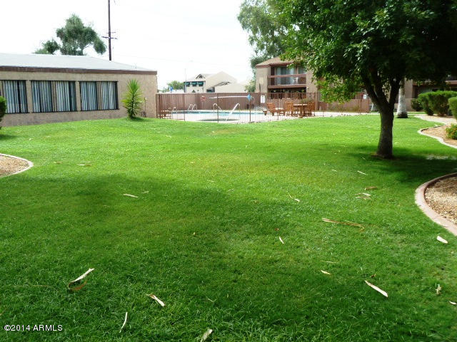 7550 North 12th Street, Unit 237 Phoenix, AZ 85020 - Photo 15 of 23 Approaching pool / rec center
