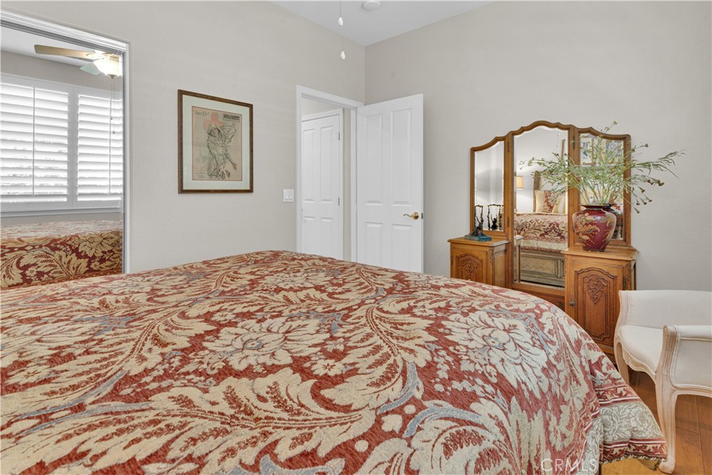 2757 Traditions Loop Paso Robles, CA 93446 - Photo 25 of 58 a bedroom with a large bed and a window