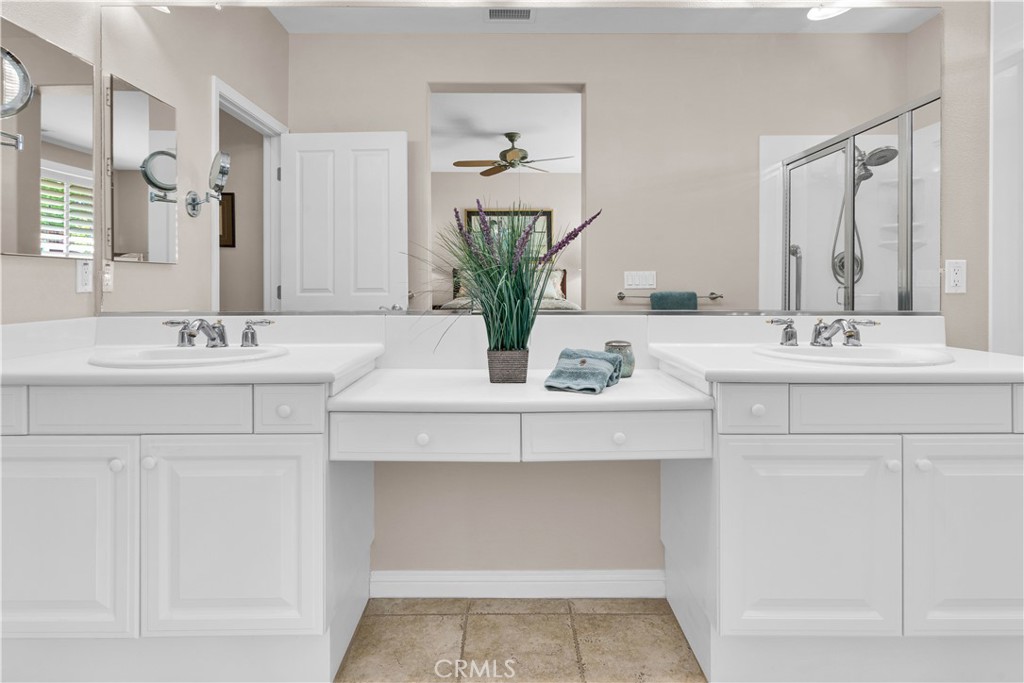 2757 Traditions Loop Paso Robles, CA 93446 - Photo 30 of 58 a bathroom with a sink vanity granite and a mirror