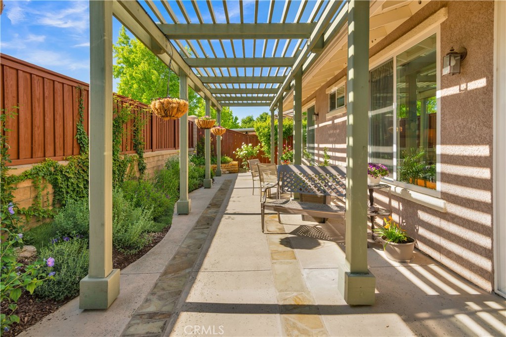 2757 Traditions Loop Paso Robles, CA 93446 - Photo 37 of 58 a view of a porch with a potted plant