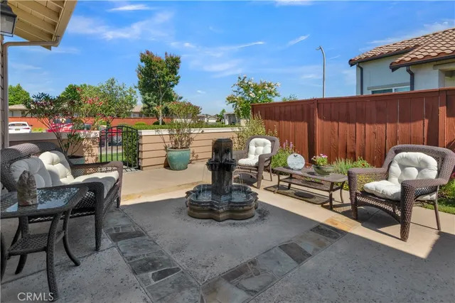 a view of a chairs and tables in the patio