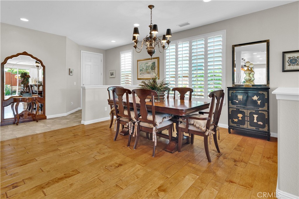 2757 Traditions Loop Paso Robles, CA 93446 - Photo 10 of 58 a view of a dining room with furniture and chandelier