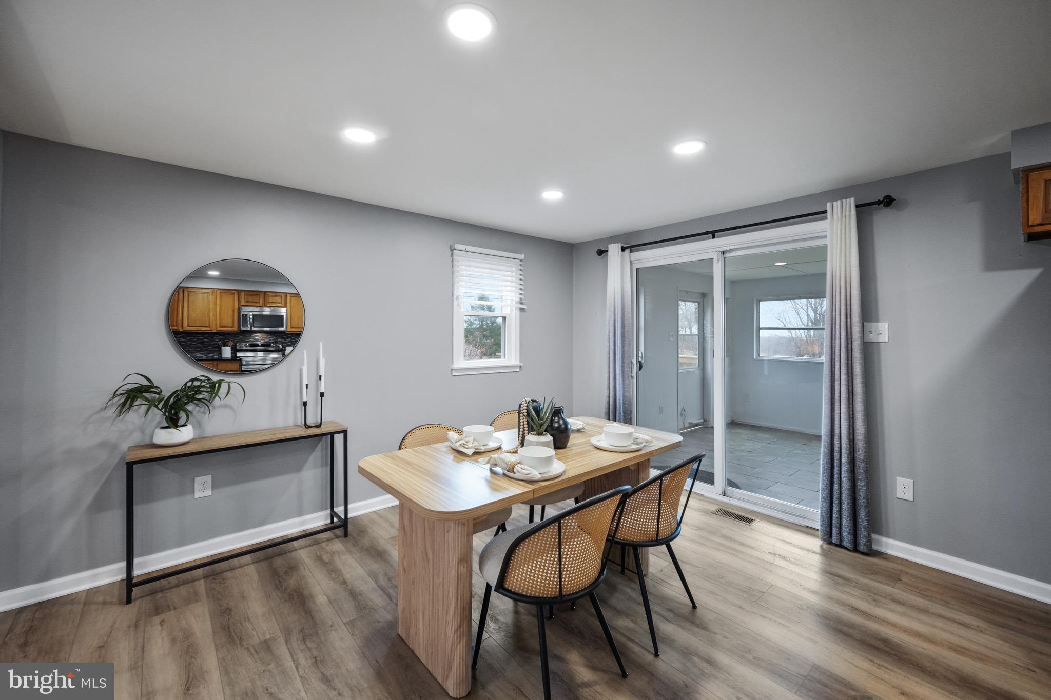15915 Trenton Road Upperco, MD 21155 - Photo 12 of 41 a view of a dining room with furniture window and wooden floor