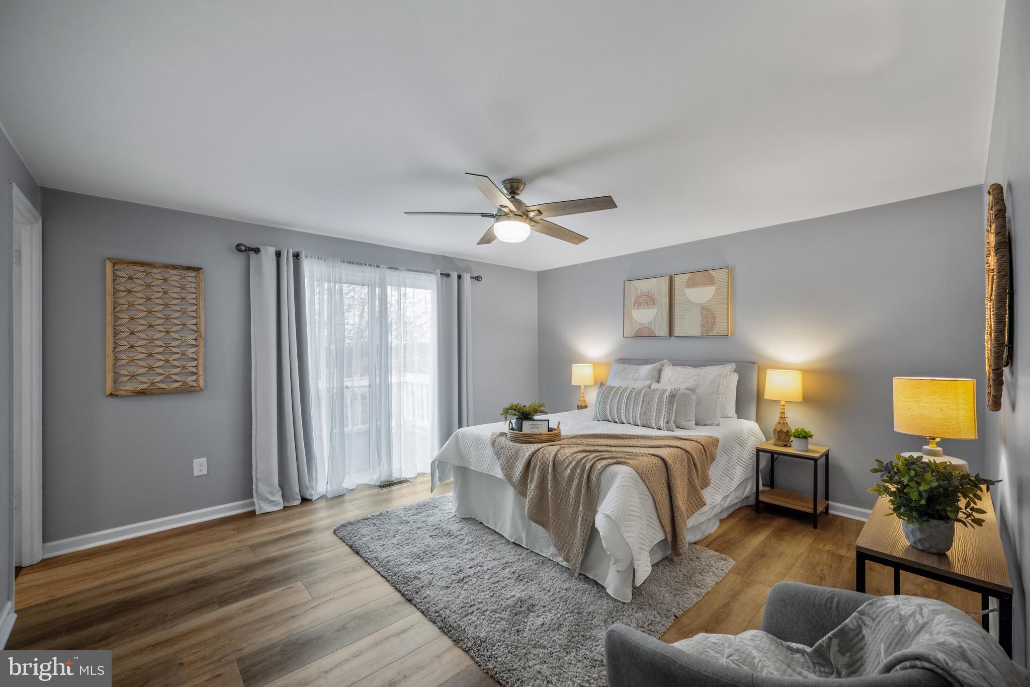 15915 Trenton Road Upperco, MD 21155 - Photo 17 of 41 a bedroom with a bed couch and window