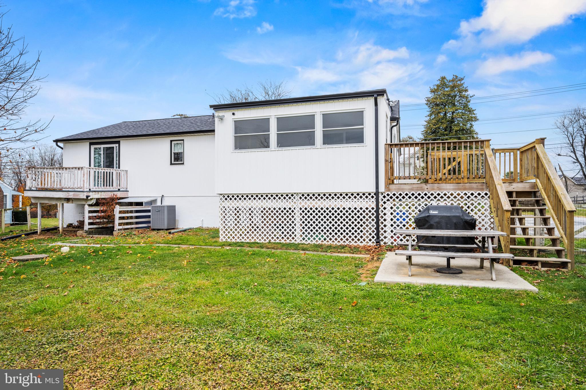15915 Trenton Road Upperco, MD 21155 - Photo 6 of 41 a view of a house with backyard and a sitting area