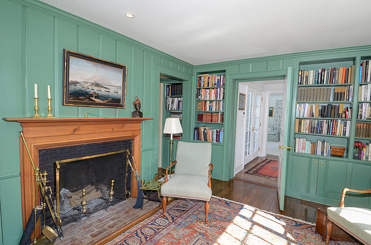 1062 Ponus Ridge Road New Canaan, CT 06840 - Photo 12 of 31 a living room with furniture and a fireplace