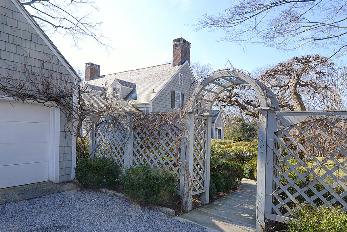 1062 Ponus Ridge Road New Canaan, CT 06840 - Photo 5 of 31 a view of a house with a yard