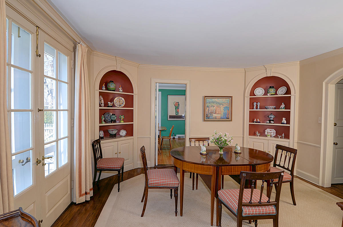 1062 Ponus Ridge Road New Canaan, CT 06840 - Photo 10 of 31 a view of a dining room with furniture and wooden floor