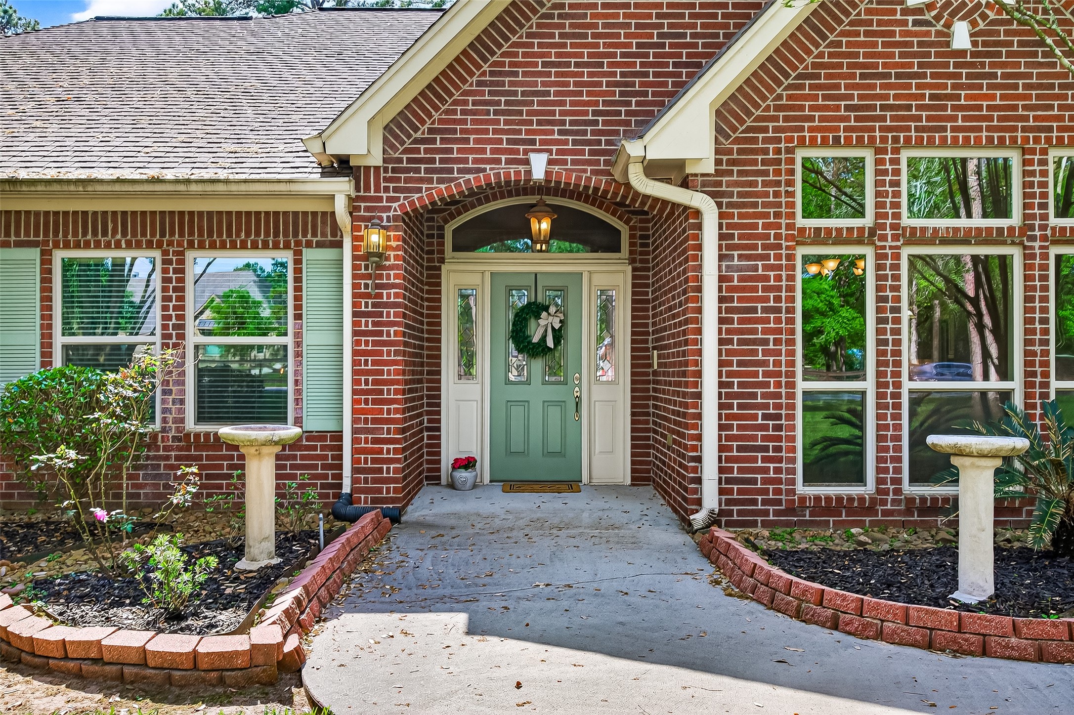 17603 Bending Cypress Road Cypress, TX 77429 - Photo 4 of 43 Large windows allow natural light, creating an inviting entrance.