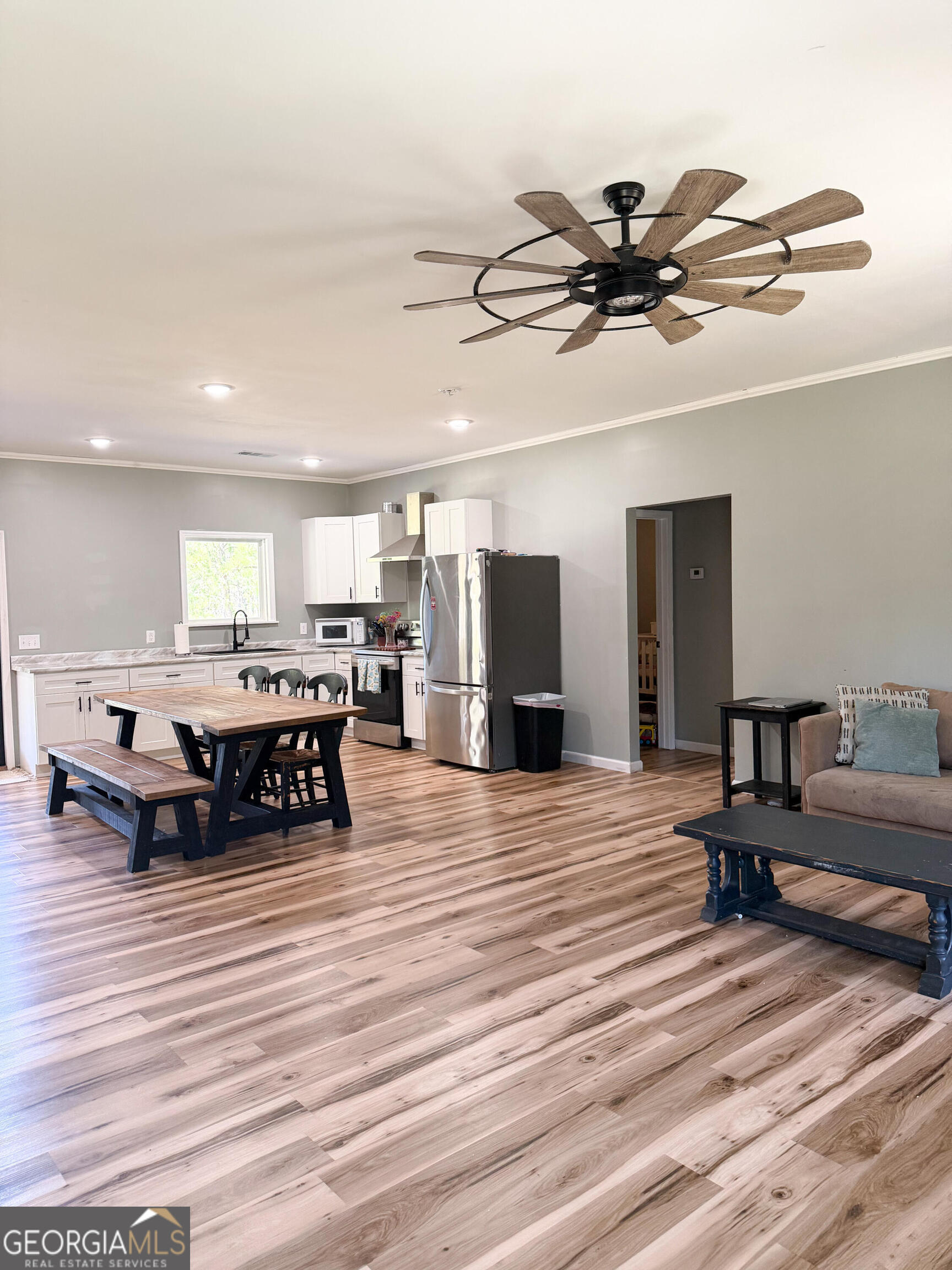 210 St Galilee Road Swainsboro, GA 30401 - Photo 5 of 18 a living room with furniture and a wooden floor