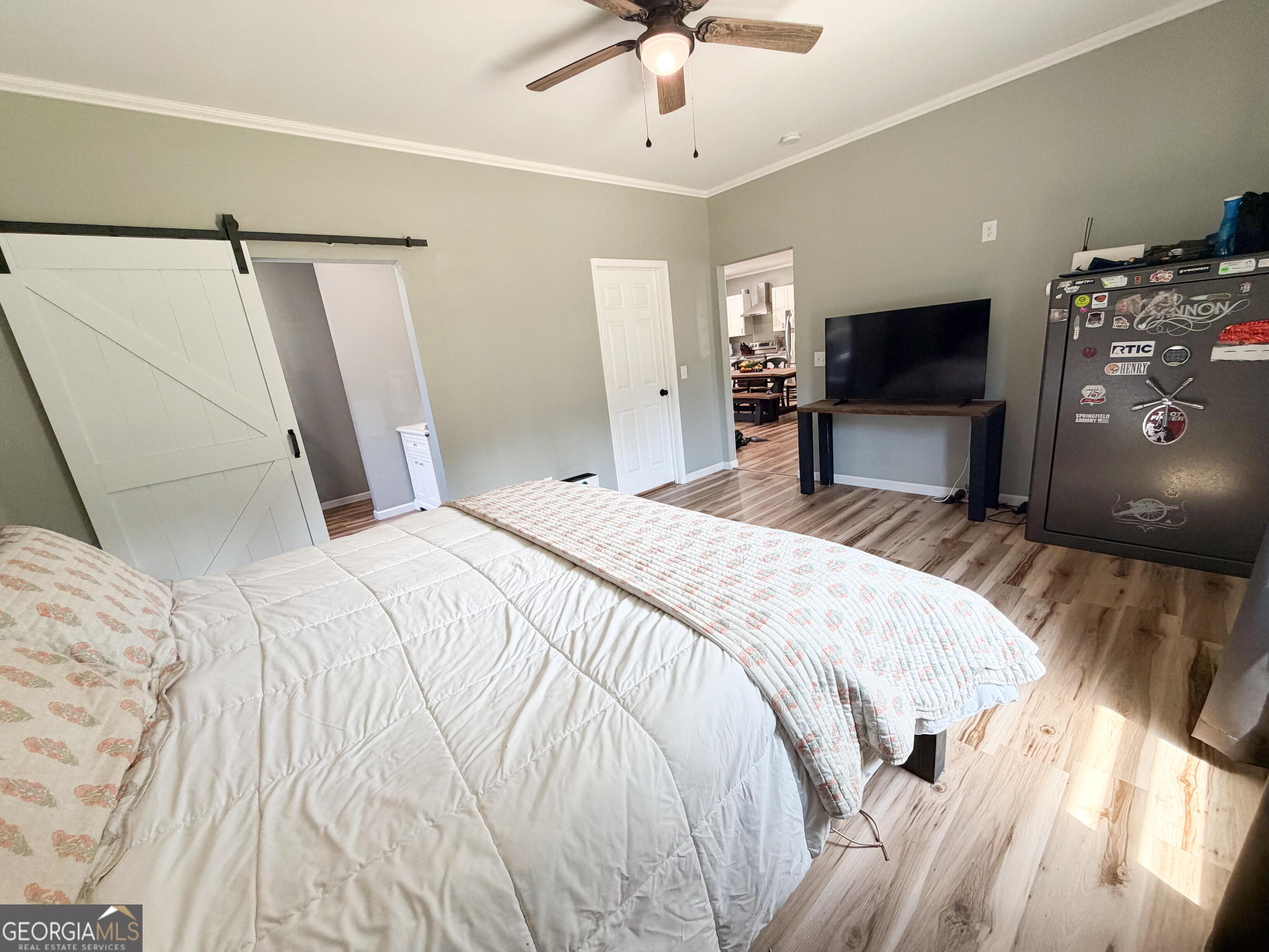 210 St Galilee Road Swainsboro, GA 30401 - Photo 10 of 18 a bedroom with a bed and a flat tv screen on dresser