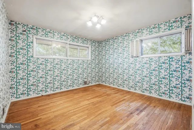 a view of wooden floor in a bathroom