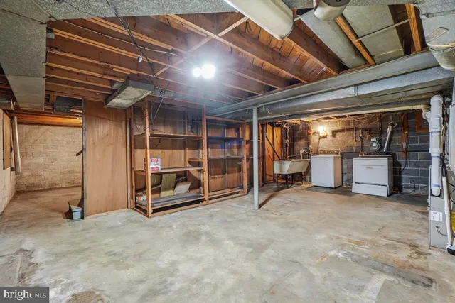 a view of an empty room with stairs