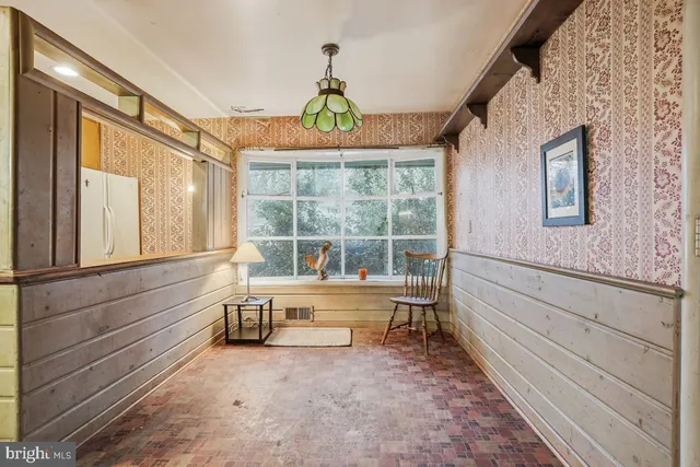 a view of a house with a porch