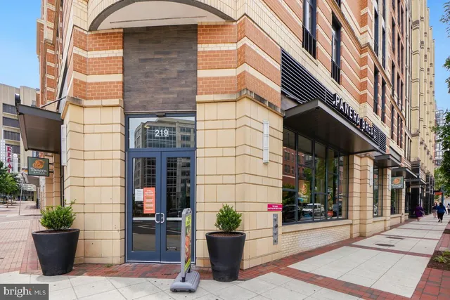 a view of a building with a street