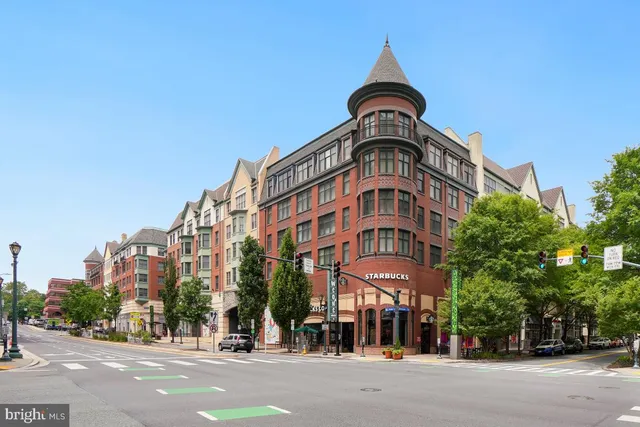 a store with yellow and red umbrella