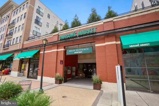 a front view of a building with a porch