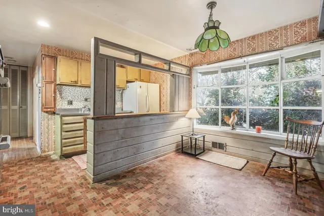 a room with furniture and window