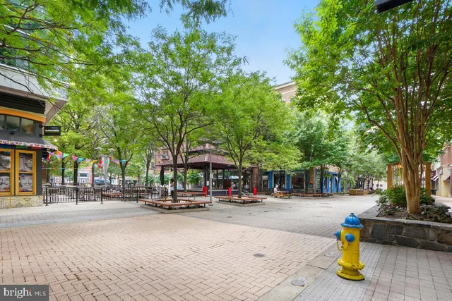 a view of street with sitting area