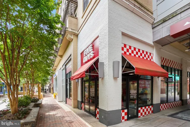 a view of a building with a street