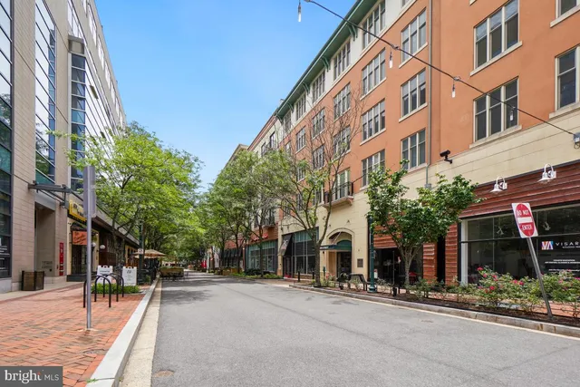 a front view of a building with garden