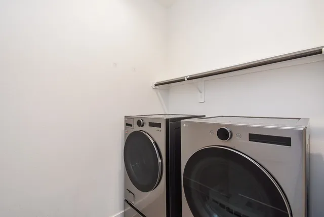 a view of a house with backyard and porch