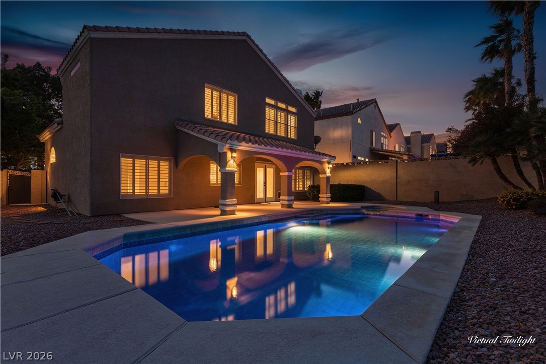 29 Olive Tree Henderson, NV 89074 - Photo 52 of 60 This spacious two-story home features a private backyard with a sparkling in-ground pool.