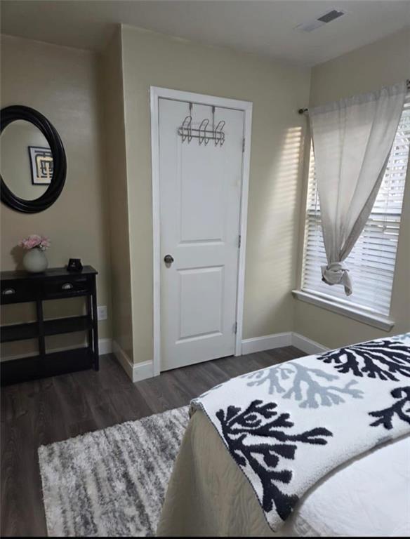 42 Highlander Trail Southwest Rome, GA 30165 - Photo 11 of 15 a bedroom with a bed and a window