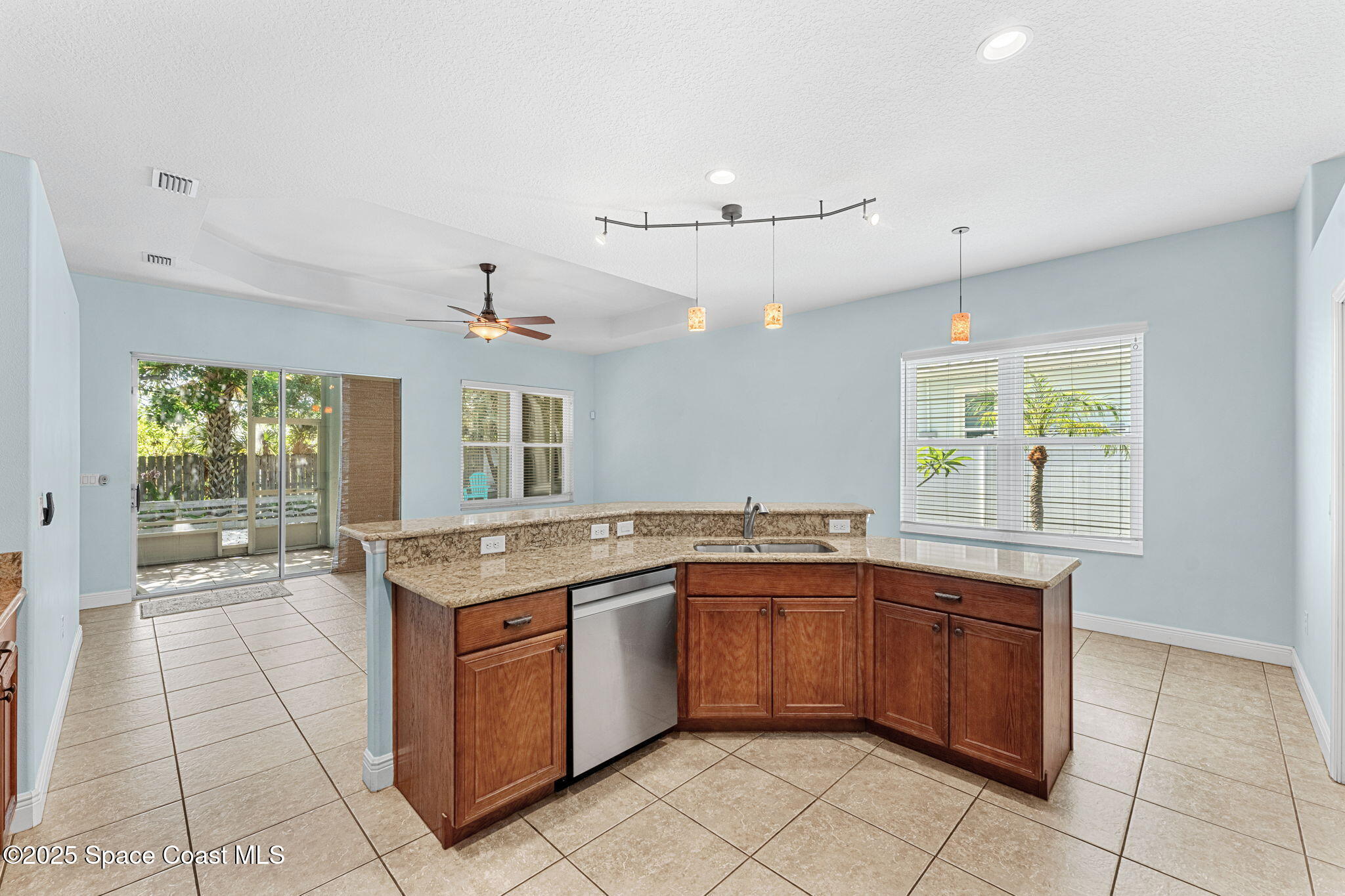 1121 South Orlando Avenue Cocoa Beach, FL 32931 - Photo 14 of 48 Kitchen into Family Room