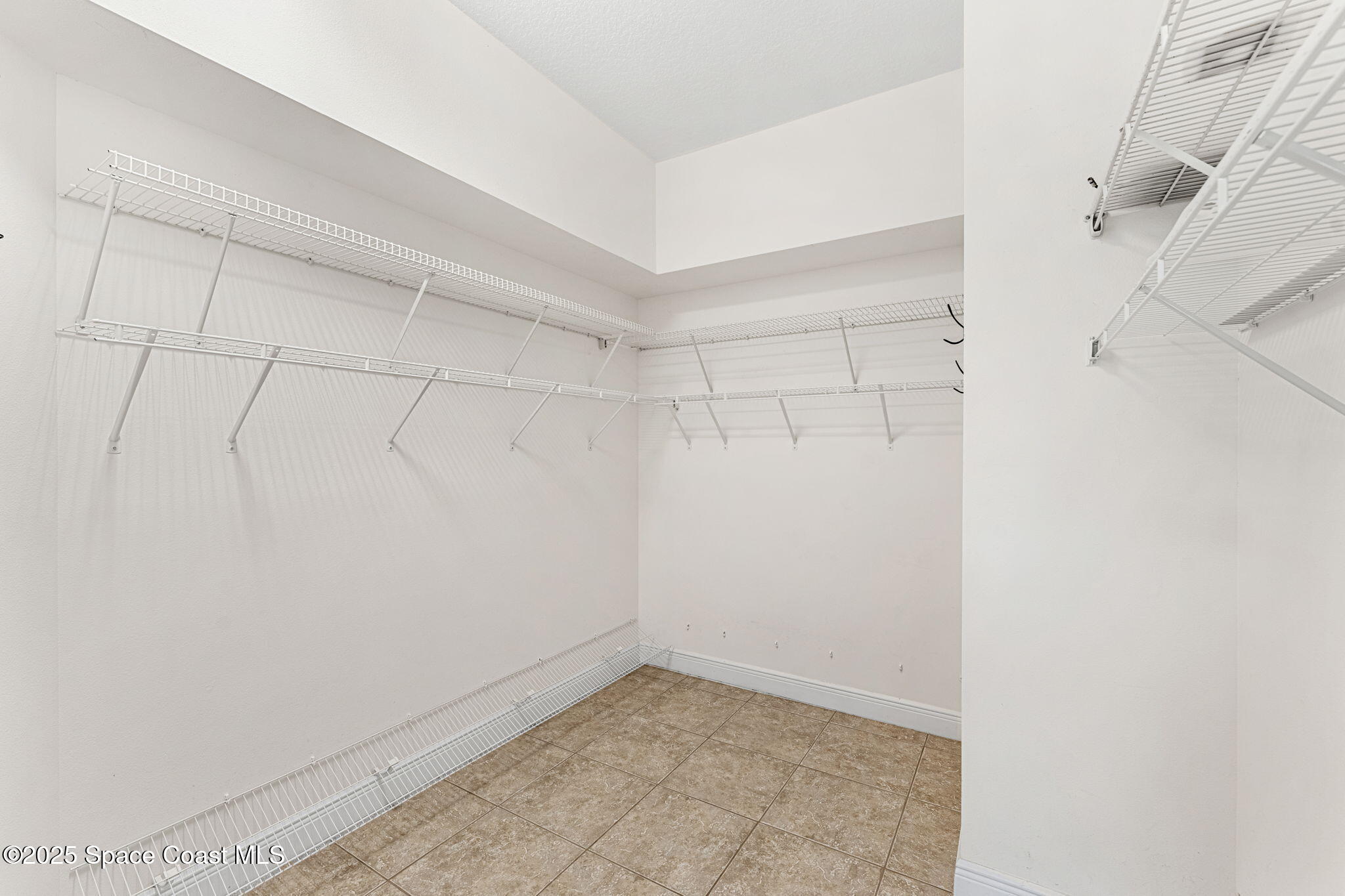 1121 South Orlando Avenue Cocoa Beach, FL 32931 - Photo 26 of 48 Huge Primary Walk In Closet